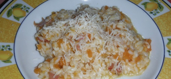 Risotto con zucca, speck e stracchino