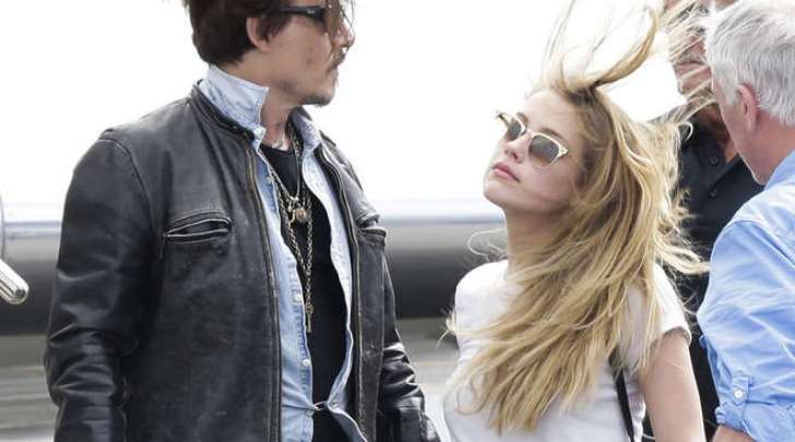 Johnny Depp e la moglie Amber Heard in Australia (Olycom)